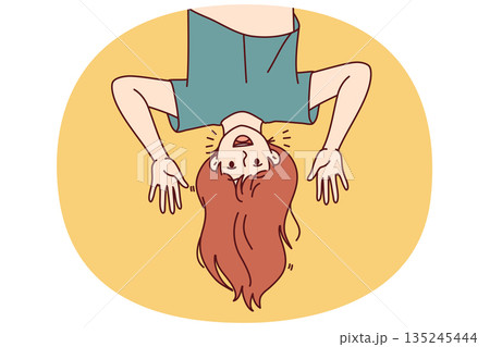 Funny girl upside and waving hands inviting friends from elementary school to play together 135245444