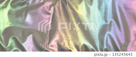 Abstract rainbow fabric background with soft folds and vibrant gradient for design projects 135245643