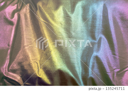Colorful fabric texture backdrop with rainbow gradient for fashion, design, and decor projects 135245711