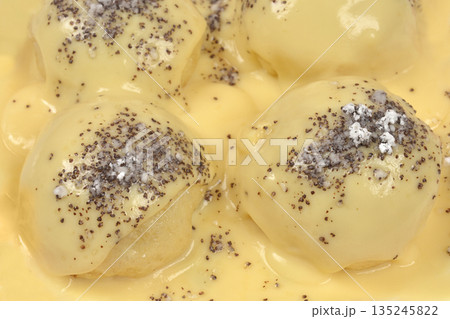 Traditional sweet dumplings with vanilla sauce 135245822