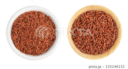 red rice in a ceramic and wooden bowl isolated on white background. Top view. Flat lay red rice in a ceramic and wooden bowl isolated on white background. Top view. Flat lay 135246131