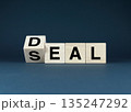 Words Deal and Seal using wooden blocks 135247292