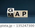 Wooden blocks spelling GAP and MAP 135247300