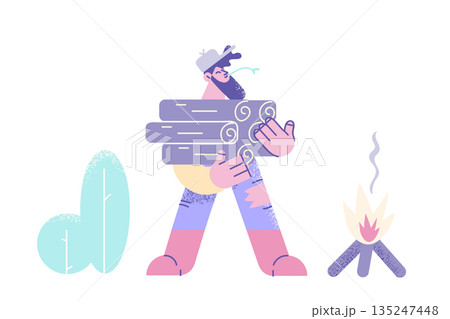 Smiling lumberman hold wood pile for fire setting 135247448