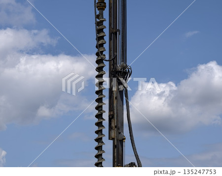 large spiral drill, abstract metallic spiral pattern used in construction and industrial 135247753