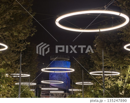 modern minimalist lighting features generate inviting luminous pathway for pedestrians after sunset modern minimalist lighting features generate inviting luminous pathway for pedestrians after sunset 135247890