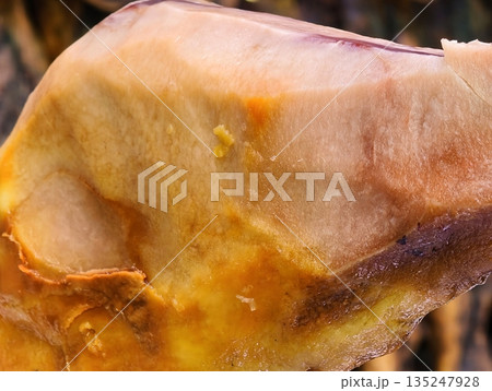 Manual ham rind removal highlights craft and traditional 135247928
