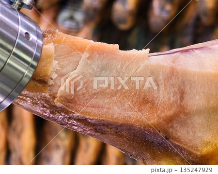 Detailed shot of aged ham showing mold and textured surface 135247929