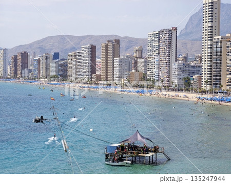 Coastal leisure scene, Relaxing coastal float with drinks Coastal leisure scene, Relaxing coastal float with drinks 135247944