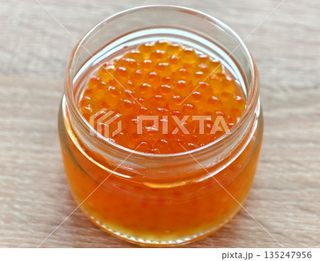 Elegant display of orange fish eggs for special occasions 135247956