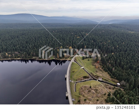 overview of tranquil rural environment showcasing winding shoreline and lakeside residences overview of tranquil rural environment showcasing winding shoreline and lakeside residences 135248101