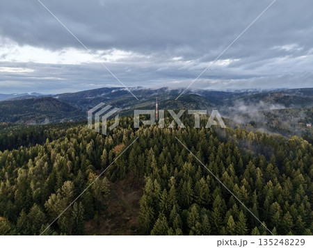 Surveillance Drone Captures Mysterious Foggy Skyline With Distant Rolling Hills And Forests Surveillance Drone Captures Mysterious Foggy Skyline With Distant Rolling Hills And Forests 135248229