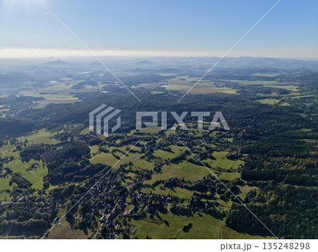 Highaltitude Rural Landscape, Aerial Perspective Showcasing Patchwork Fields And Rural Hamlets 135248298