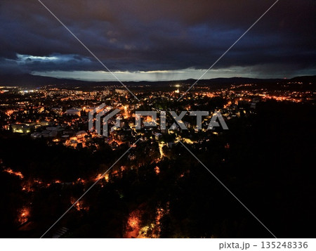 Illuminated Hillside Under Moonlight, Moonlit City Skyline With Glowing Streets And Tranquil Reflections Illuminated Hillside Under Moonlight, Moonlit City Skyline With Glowing Streets And Tranquil Reflections 135248336