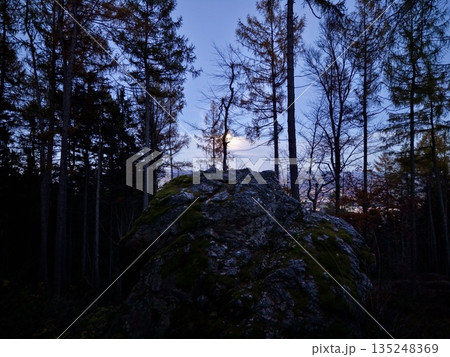 Mountain Scene Imagery, Evening Forest With Moonrise, Sunset Silhouettes Among Trees And Rocks Mountain Scene Imagery, Evening Forest With Moonrise, Sunset Silhouettes Among Trees And Rocks 135248369