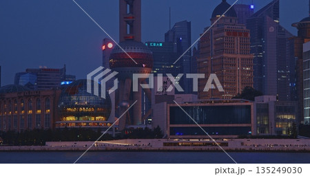 Iconic Shanghai Landmarks Captured During Evening Glow with City Lights Shining Iconic Shanghai Landmarks Captured During Evening Glow with City Lights Shining 135249030