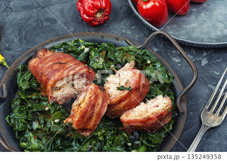 Meat Rolls Stuffed with Vegetables on a Plate 135249358