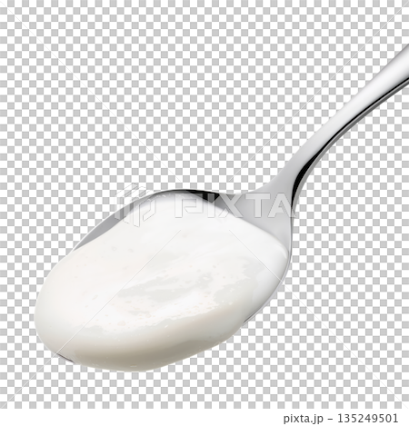 Cream is Placed on a Silver Spoon in a Bright Setting During a Kitchen Preparation Cream is Placed on a Silver Spoon in a Bright Setting During a Kitchen Preparation 135249501