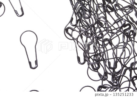 Background of pear-shaped pins on a white background Background of pear-shaped pins on a white background 135251233