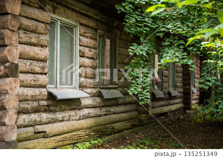 Rustic Log cabin and window. Old wooden log house window background Rustic Log cabin and window. Old wooden log house window background 135251349