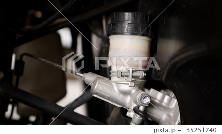 Old car suspensions. Close up car suspension wear and tear parts. CV joint Rubber boot and Control arms bushing Steering rack axles Shock absorber Brake exhaust. Gas Diesel car service repair parts. Old car suspensions. Close up car suspension wear and tear parts. CV joint Rubber boot and Control arms bushing Steering rack axles Shock absorber Brake exhaust. Gas Diesel car service repair parts. 135251740