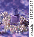 Purple nail polish bottle mock up surrounded by pearls and gemstones with copy space 135251897