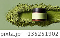 Green cosmetic cream jar mock-up with copy space and vibrant green powder background 135251902