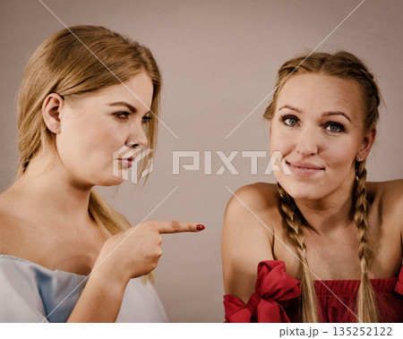 Women accusing each other of something Women accusing each other of something 135252122