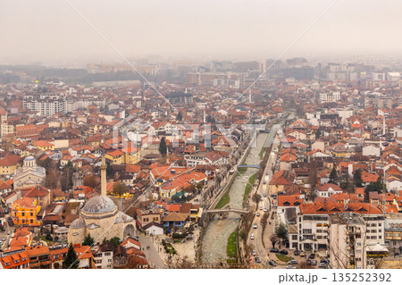 City center with Ottoman era Sinan Pasha mosque, stone architecture, Bistrica riverbank streets and dense urban housing in a historic Balkan town, Prizren, Kosovo City center with Ottoman era Sinan Pasha mosque, stone architecture, Bistrica riverbank streets and dense urban housing in a historic Balkan town, Prizren, Kosovo 135252392