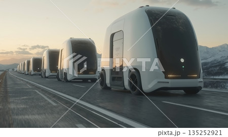 Convoy of futuristic autonomous electric trucks driving on a highway. Self-driving vehicles in a platoon representing the future of logistics and transportation technology Convoy of futuristic autonomous electric trucks driving on a highway. Self-driving vehicles in a platoon representing the future of logistics and transportation technology 135252921