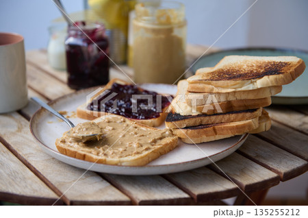 Homemade Toast With Peanut Butter And Jam On A Rustic Wooden Table Breakfast Spread 135255212