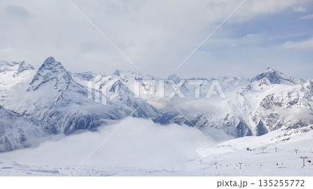 Panoramic winter view of Dombay ski resort Panoramic winter view of Dombay ski resort 135255772