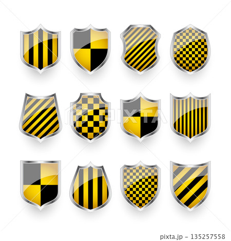 Glossy shields with yellow and black pattern. Security and protection concept. Cyber safety icons, internet privacy, web defense, digital data protection and antivirus themes. Vector illustration 135257558