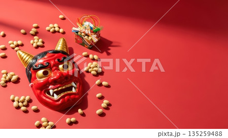 赤い背景に鬼のお面と豆まきを表現した節分の広告用背景素材 135259488