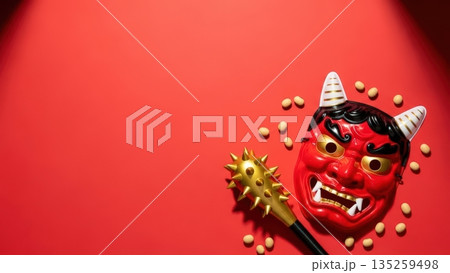赤い背景に鬼のお面と豆まきを表現した節分の広告用背景素材 135259498