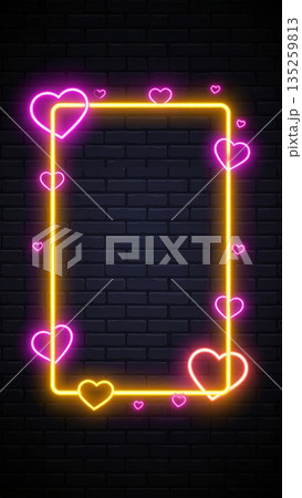 Pink and Yellow Neon Heart Frame on Wall Background 135259813