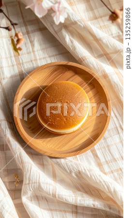 Dorayaki with Red Bean Filling on Wooden Plate Dorayaki with Red Bean Filling on Wooden Plate 135259866