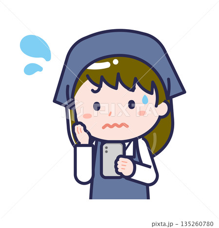 スマートフォンを使う「スタッフ」の女性 135260780