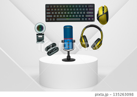 Gaming and streaming accessories including RGB keyboard, headphones, mic, webcam floating above podium Gaming and streaming accessories including RGB keyboard, headphones, mic, webcam floating above podium 135263098