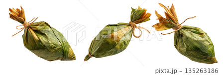 Venezuelan tamales wrapped in corn husk, tied with rustic rope, isolated on white background, representing South American cuisine Venezuelan tamales wrapped in corn husk, tied with rustic rope, isolated on white background, representing South American cuisine 135263186