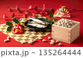 節分 豆まきの福豆と鬼の面 柊鰯と梅の花の和風背景素材 2月の伝統行事 135264444