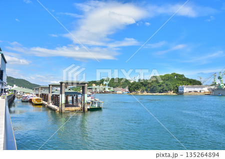 広島　尾道駅前から見た青空の向島ドックと尾道水道 135264894