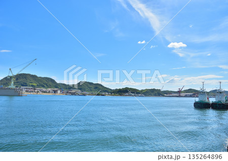 広島　尾道駅前から見た青空の向島ドックと尾道水道 135264896