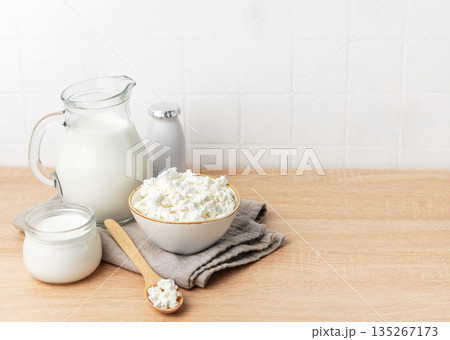 Fresh cottage cheese, milk, and yogurt creating a healthy breakfast Fresh cottage cheese, milk, and yogurt creating a healthy breakfast 135267173