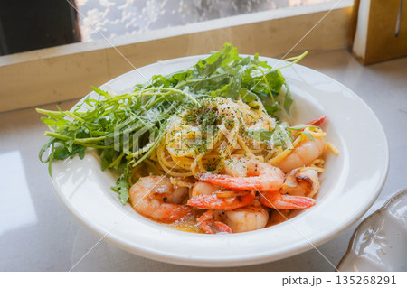 Shrimp Aglio e Olio Pasta with Fresh Arugula Shrimp Aglio e Olio Pasta with Fresh Arugula 135268291