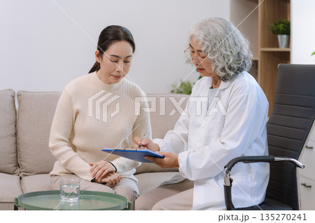 Female patient receiving therapy for depression and stress in a psychiatric clinic. 135270241