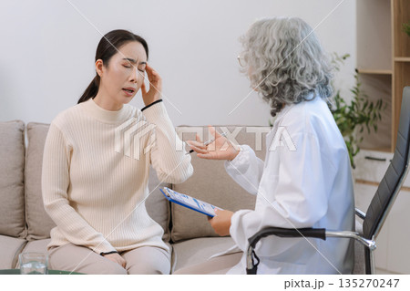 Female patient receiving therapy for depression and stress in a psychiatric clinic. 135270247