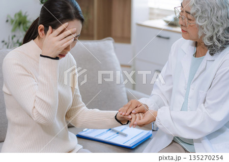 Female patient receiving therapy for depression and stress in a psychiatric clinic. 135270254