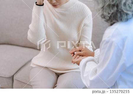 Female patient receiving therapy for depression and stress in a psychiatric clinic. Female patient receiving therapy for depression and stress in a psychiatric clinic. 135270255