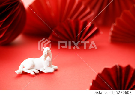 A festive Chinese New Year background with red paper fans. 135270607